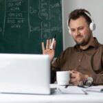 teacher-doing-english-lesson-online-his-students (1) (1)