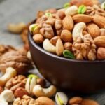 Bowl of premium flavoured nuts with healthy seasonings and mixed nuts