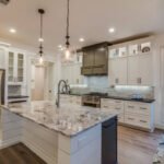 Large appliances and white cabinets in new kitchen