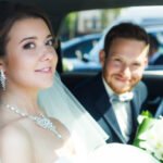 Just married couple in a car