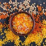 Assorted pulses in bowls showing different varieties of dal