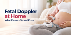 Pregnant woman using a handheld fetal Doppler at home