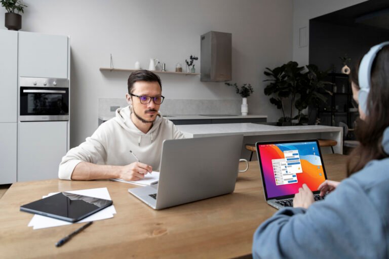 man-woman-working-from-home-together-desk